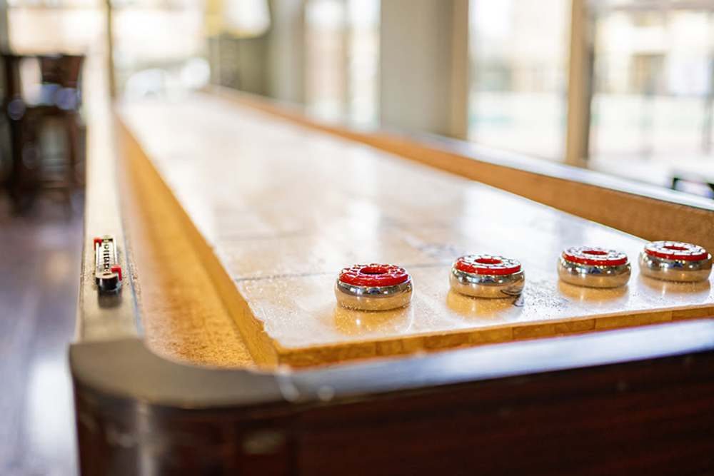 Shuffle board in clubhouse at Blue Ridge in Midland, Texas