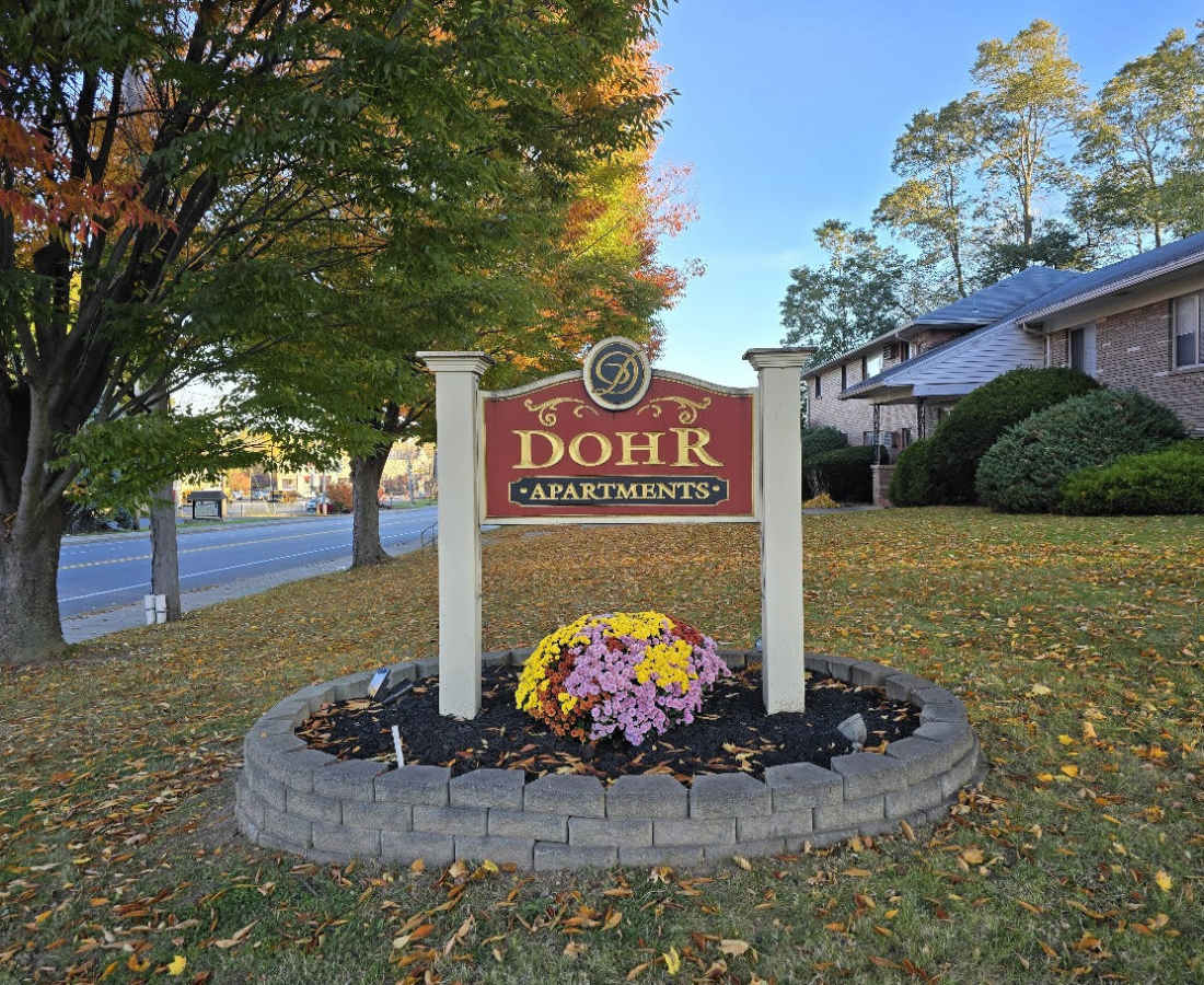 Front view of sign board at Dohr Apartments in Rochester, New York