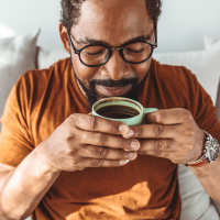 A resident man enjoying his morning coffee at 280 Park Place in Irvington, New Jersey