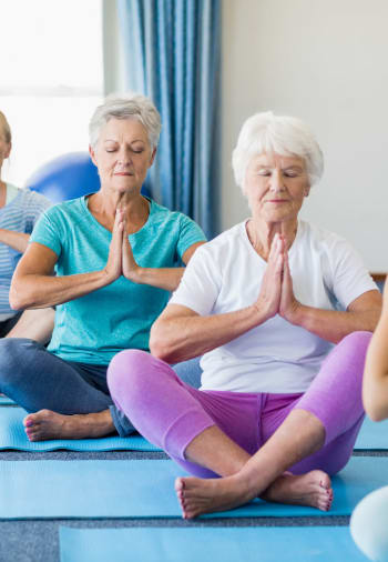 A resident in a wellness class at The Claiborne at Newnan Lakes in Newnan, Georgia