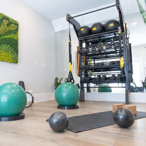 Two green exercise balls on the floor at Chamberlain Pines in Summerville, South Carolina