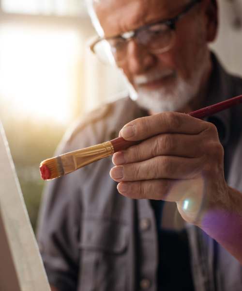 Resident painting in his home at {location_name}} in Bradenton, Florida