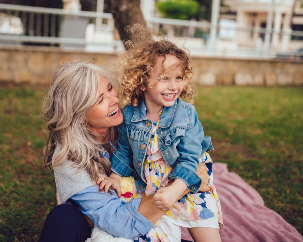 Resident playing at a park with her granddaughter near Pasadena Highlands in Pasadena, California