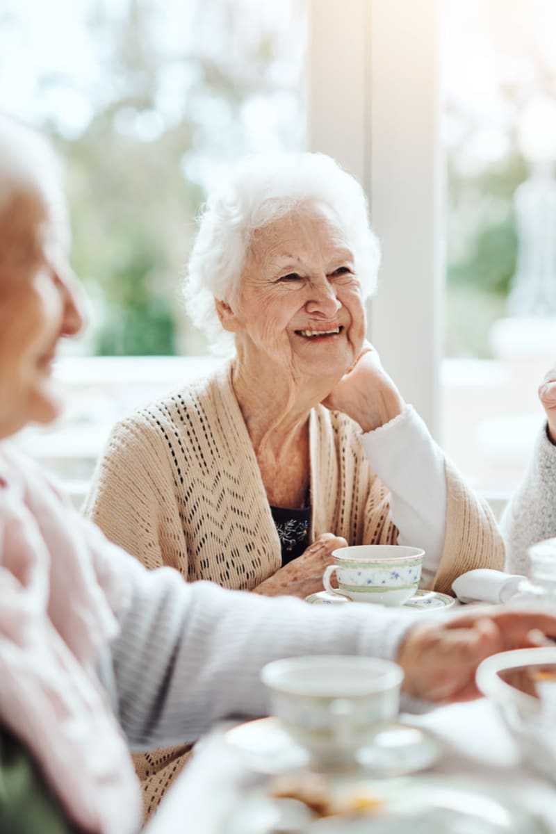 Resident enjoying lunch and tea with friends at Ingleside Communities in Mount Horeb, Wisconsin