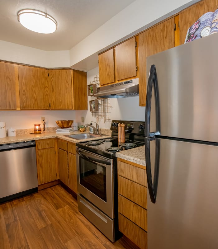 Kitchen with granite countertops at Council Place Apartments in Oklahoma City, Oklahoma