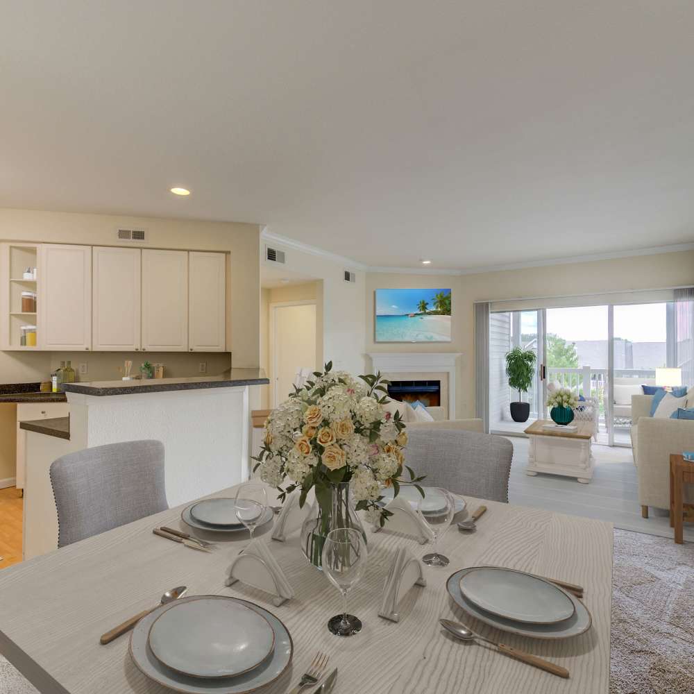 Charming dining area overlooking a modern kitchen and cozy living space at Boulder Springs in Maryland Heights, Missouri.