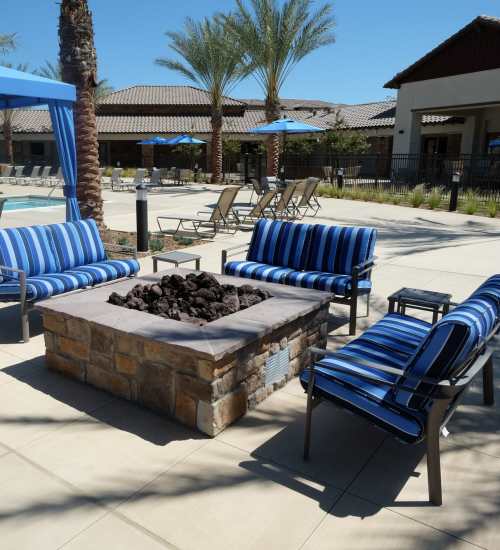 Outdoor firepit beside the pool at Pacific Landing in Murrieta, California