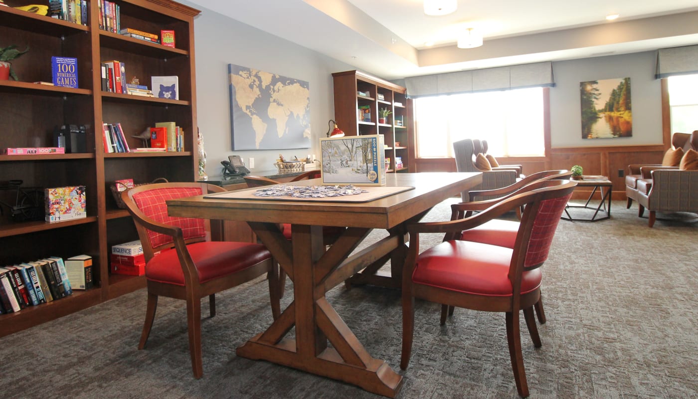 Community library with seating at The Pillars of Mankato in Mankato, Minnesota