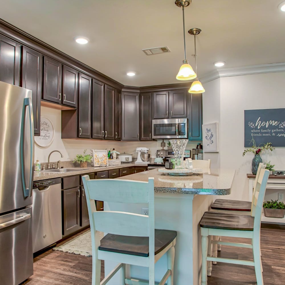 Gourmet kitchen with stainless-steel appliances at Highland Hills, Cumberland, Rhode Island