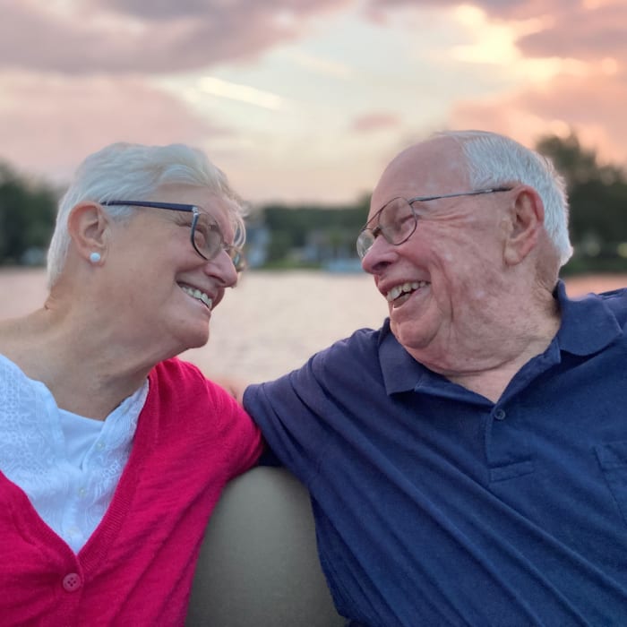 Residents enjoying a sunset by a lake near Presbyterian Communities of South Carolina in Columbia, South Carolina