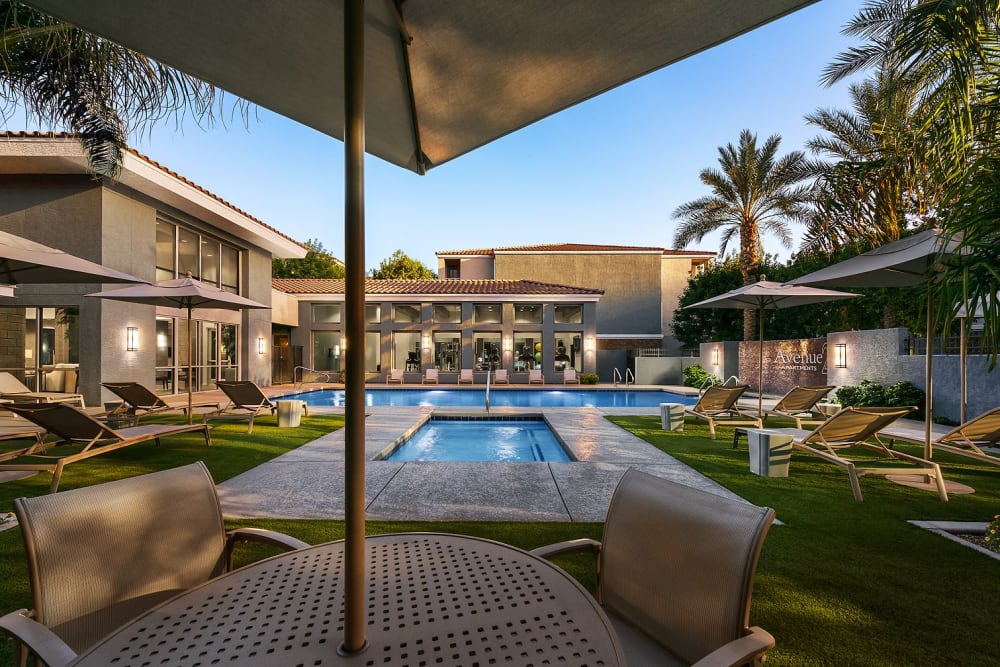 Swimming pool and lounge chairs at Avenue 25 in Phoenix, Arizona