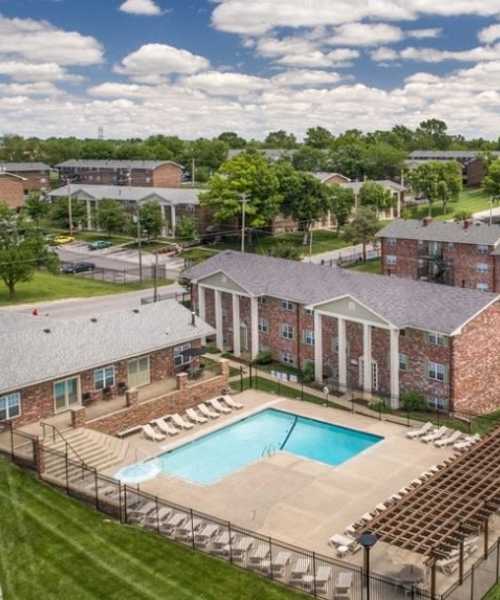 Aerial view of the community swimming pool at Columbia Crossing Apartments in Columbia, Missouri