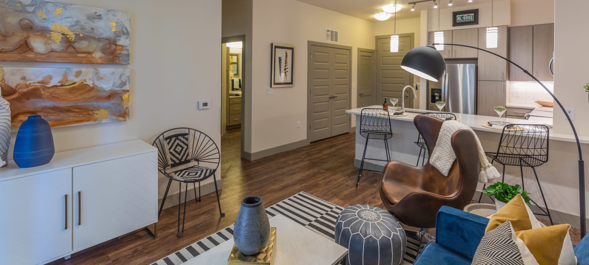 Classically furnished model home's living area at The Alcott in Denver, Colorado