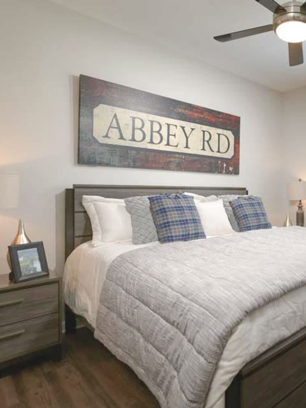 Luxurious bedroom with modern updates at Woodhaven at Park Bridge in Alpharetta, Georgia
