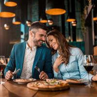 Couple having lunch near Millennium Place in Corinth, Texas