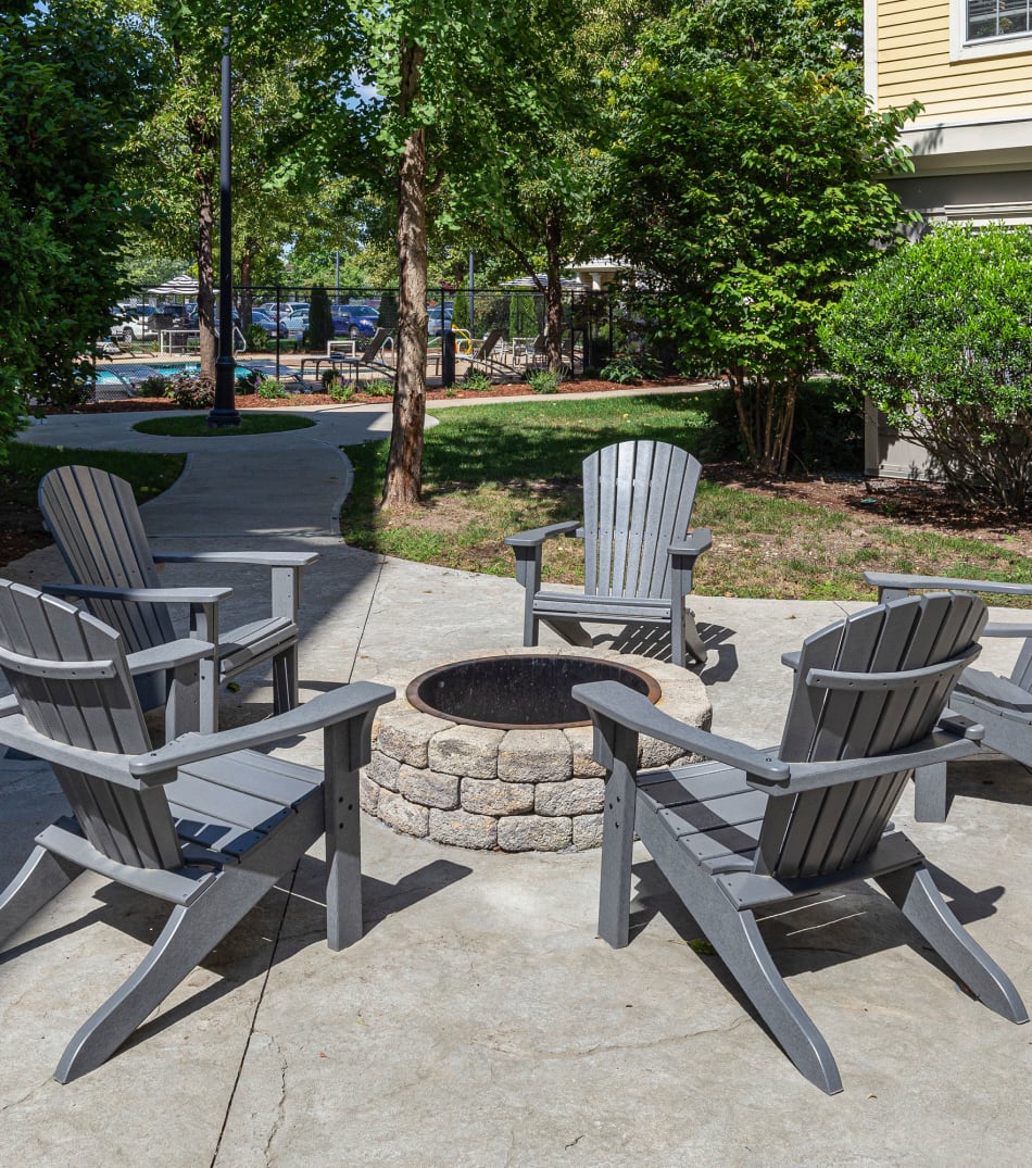 Outdoor firepit area with chairs to sit in and enjoy at Sofi at Salem Station in Salem, Massachusetts