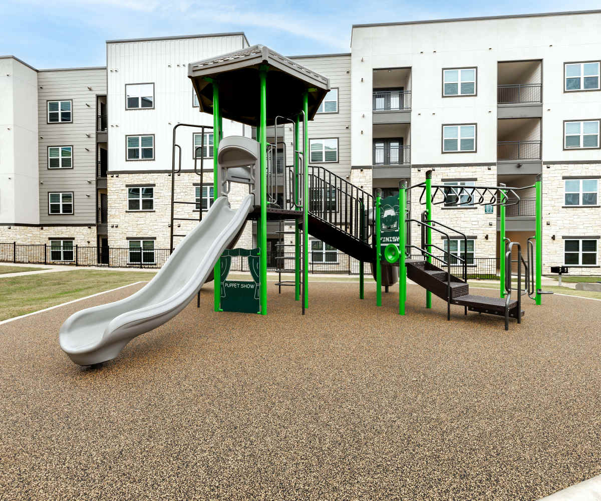 Playground at The Janson in Del Valle, Texas