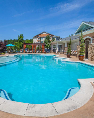 Resort-style swimming pool at Riverside Parc Apartments in Atlanta, Georgia