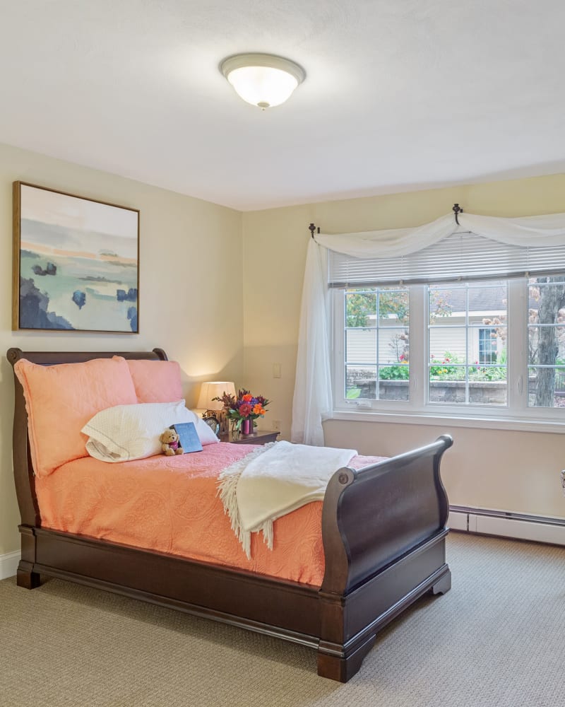 Bed in a 1 bedroom senior apartment at The Hearth at Castle Gardens in Vestal, New York