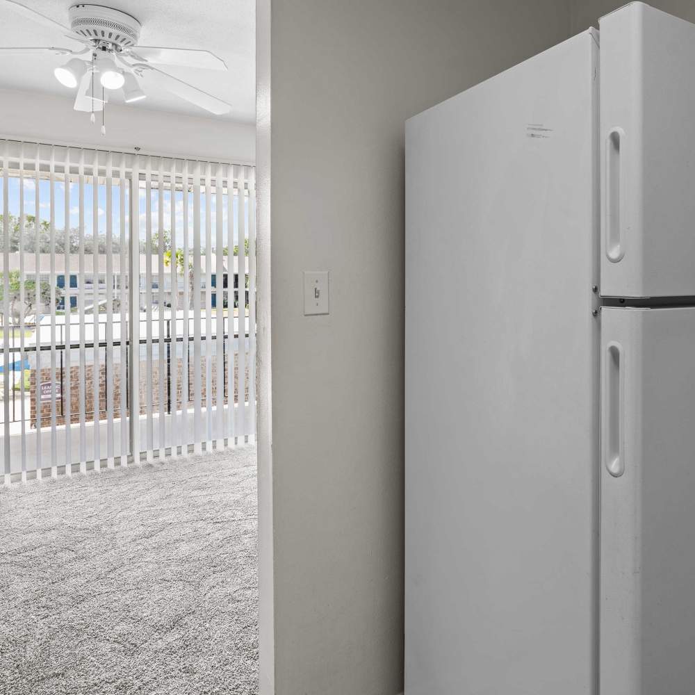 Living room with a fancy ceiling fan at Falcon House in Fort Walton Beach,Florida