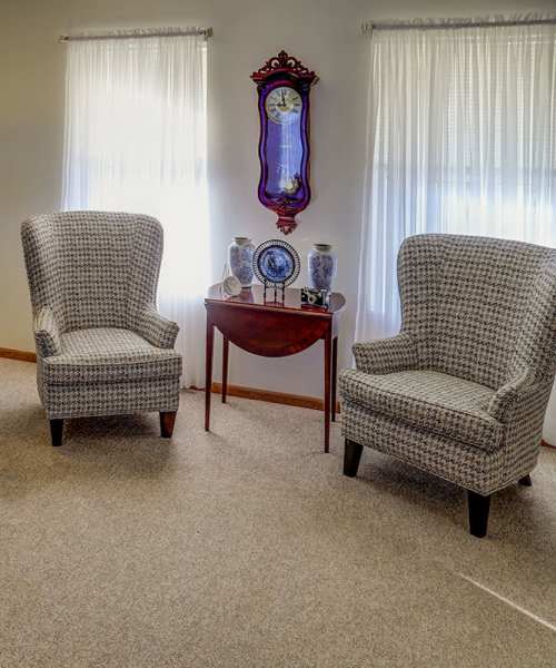 Living room with a couple of windows at Zacharys Crossing in Washington Court House, Ohio