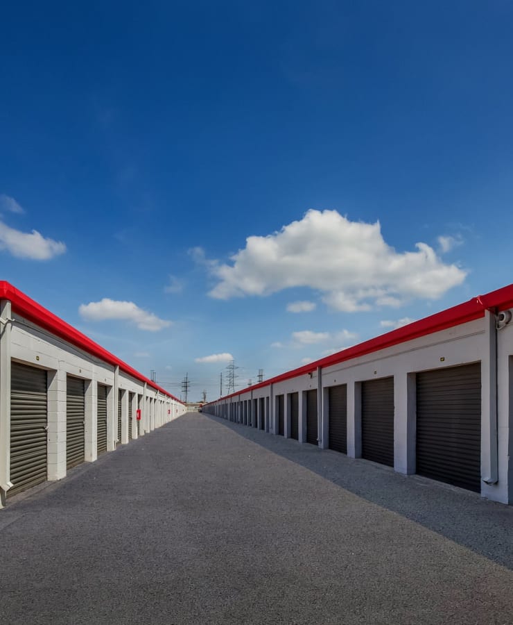 Outdoor storage units with drive-up access at StorQuest Economy Self Storage in Houston, Texas