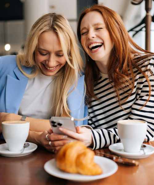 Friends having hot chocolate near The Marling in Madison, Wisconsin