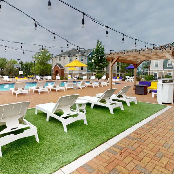 Community clubhouse with pool at The Quarters at Cedar Falls in Cedar Falls, Iowa