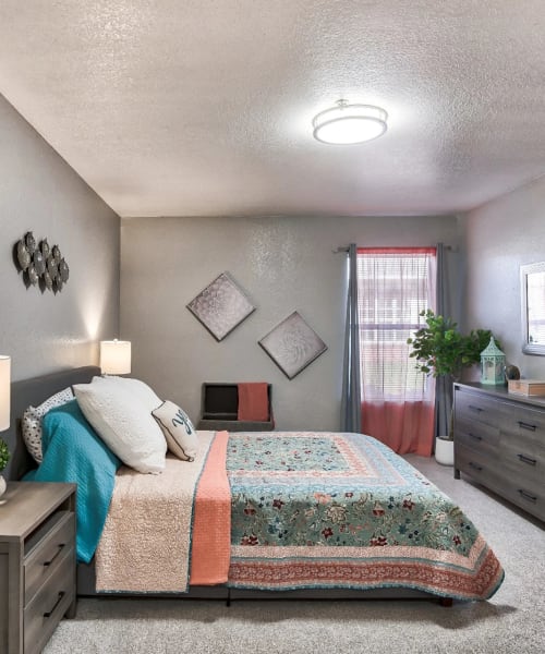 Model bedroom in a furnished apartment at Reserve at Stillwater in Durham, North Carolina