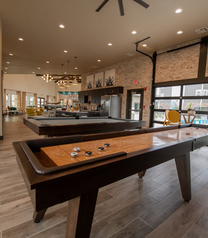 Shuffle board at Bend at New Road Apartments in Waco, Texas