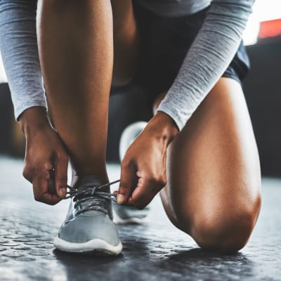 Resident lacing up for fitness at Anatole on MacArthur in Oklahoma City, Oklahoma