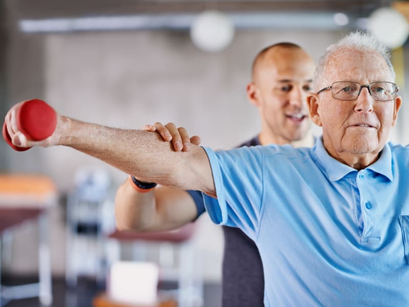 Resident exercising in the therapy gym at Holton Manor in Elkhorn, Wisconsin