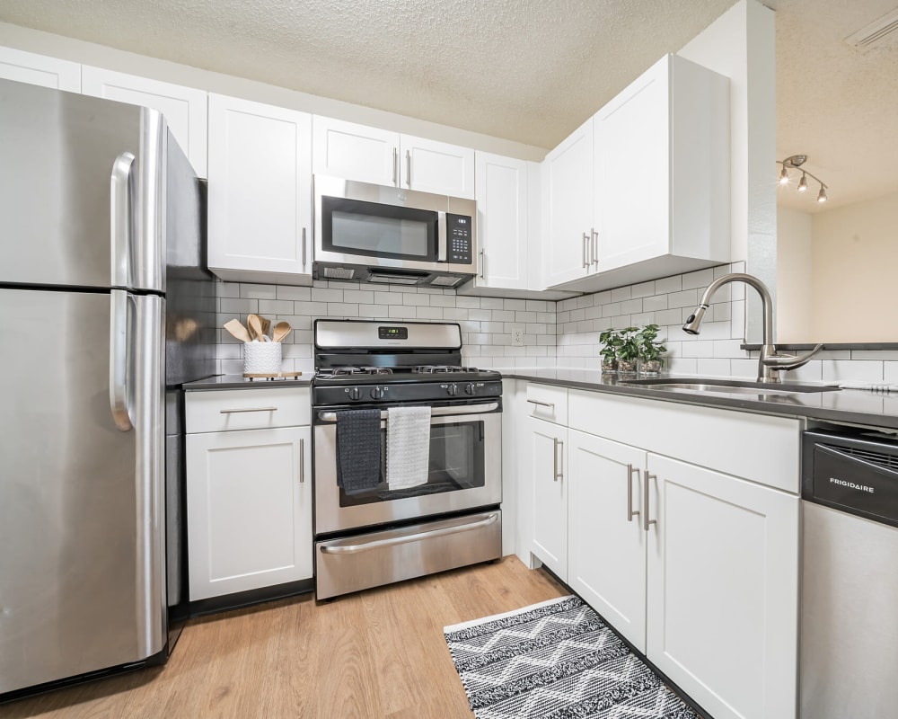 Modern kitchen appliances and cabinetry at Vista Point Apartments in Wappingers Falls, New York