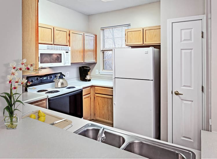 Cook your favorite meal in your kitchen at Highlands of Montour Run