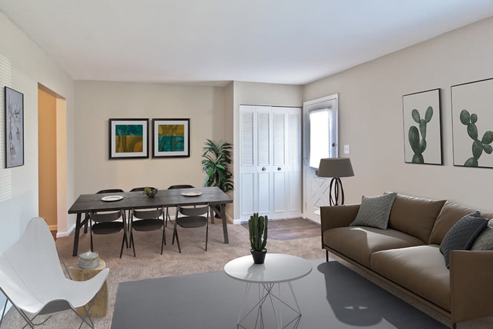 Model living room and dining table at The Summit at Ridgewood in Fort Wayne, Indiana