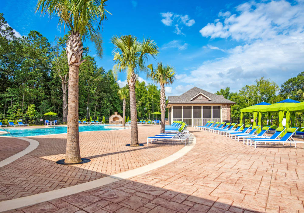 Large swimming pool and deck at Bacarra Apartments in Raleigh, North Carolina