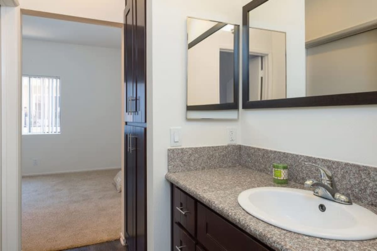 Bathroom with mirror at The Joshua Apartments, Los Angeles, California