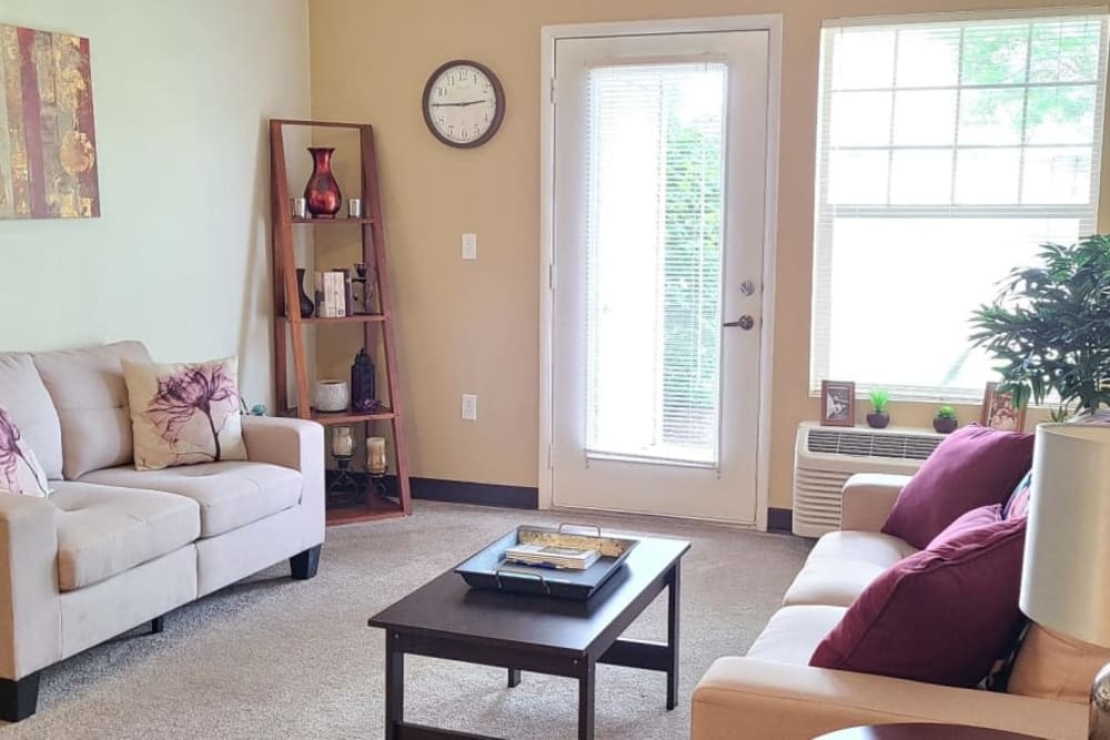 Welcoming living room in apartment at Lakeland Senior Living in Eagle Point, Oregon. 