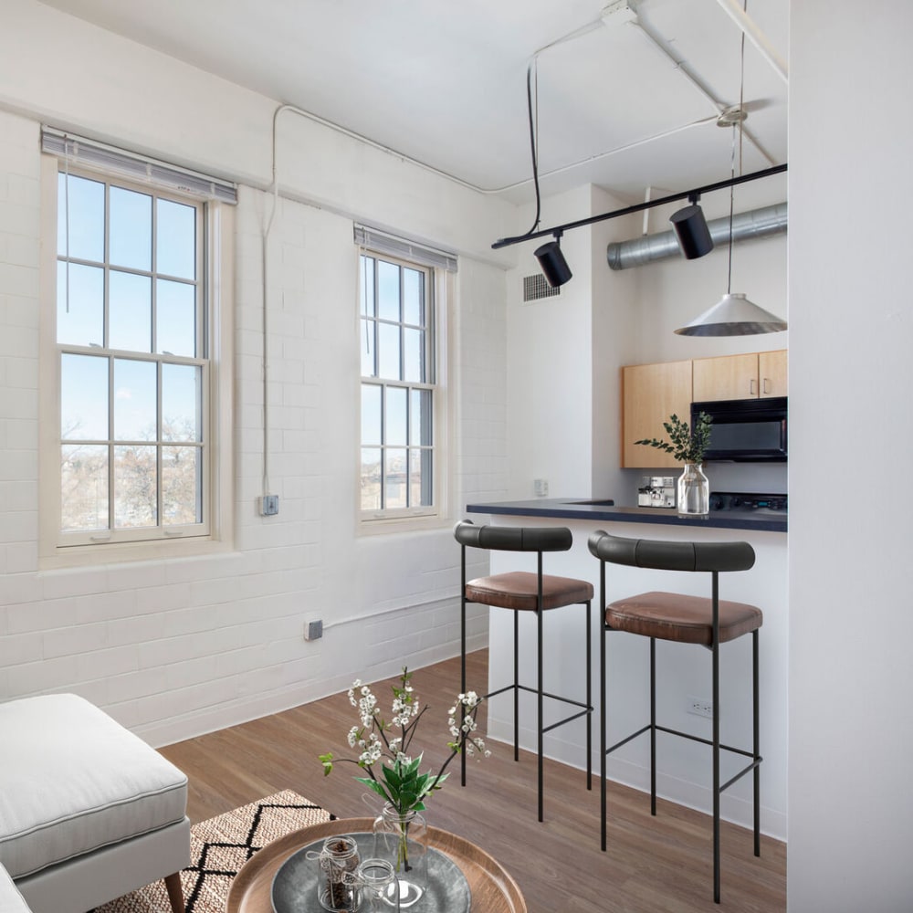 Model bedroom with soft carpets at Grand Lowry Lofts in Denver, Colorado