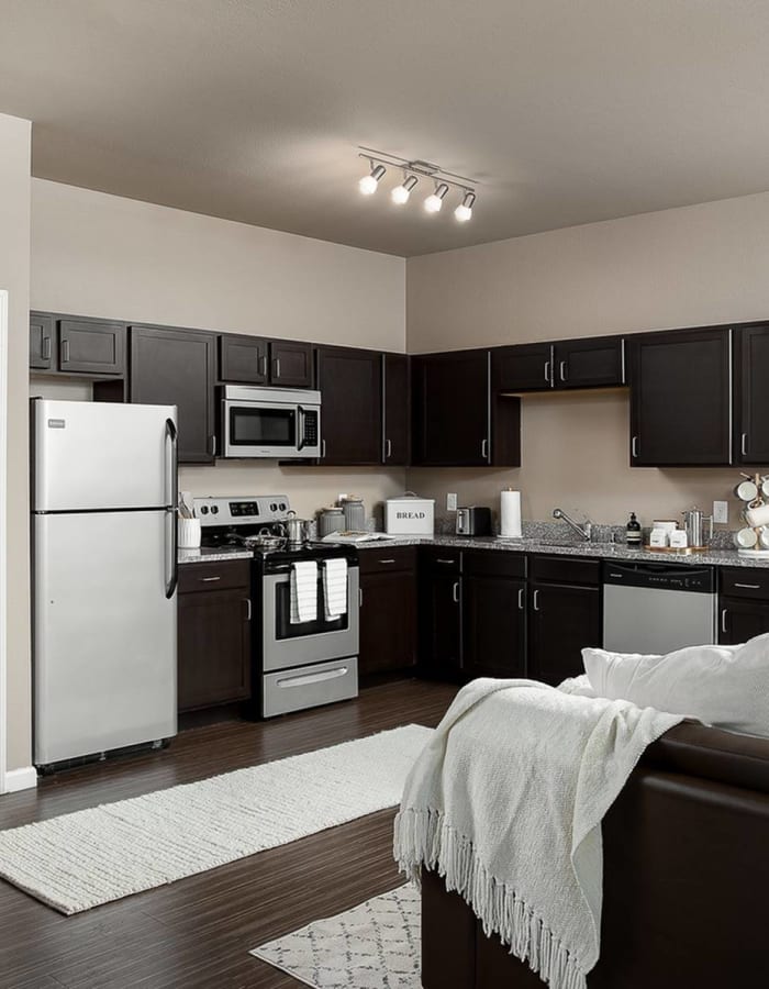 Sleek kitchen with stainless-steel appliances at The Wyatt in Lexington, Kentucky 