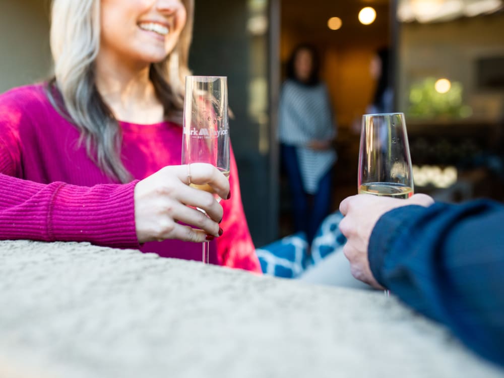 Residents enjoying some champagne at The Reserve at Gilbert Towne Centre in Gilbert, Arizona