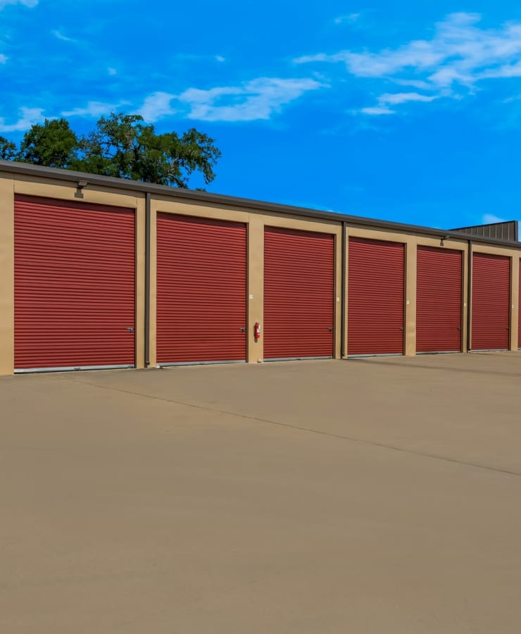 Exterior drive-up self storage units at StorQuest Self Storage in Kyle, Texas