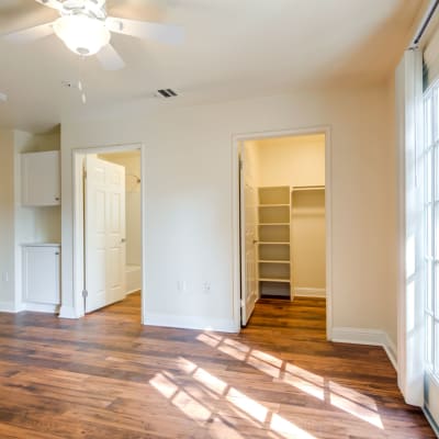 Spacious bedroom with walk-in closet and bathroom in a home at Stuart Mesa in Oceanside, California