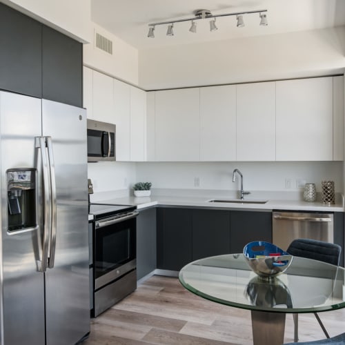 Stainless-steel appliances in an apartment kitchen at MB Station in Miami, Florida