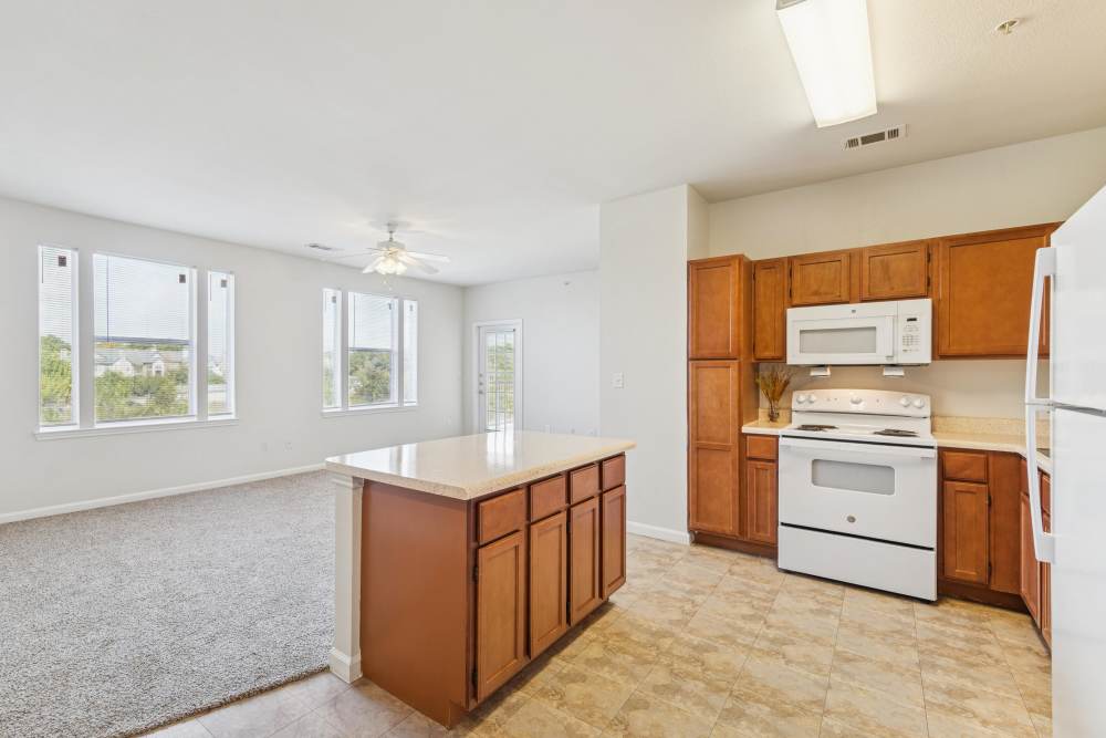 Kitchen having tile flooring at Costa Vizcaya in Houston, Texas