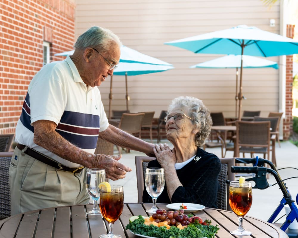 Two residents share a conversation at The Harmony Collection at Hanover in Mechanicsville, Virginia