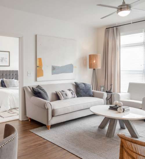 Brightly lit living room at The Heron Downtown in Baton Rouge, Louisiana