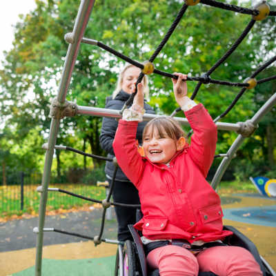 Resident kid playing in the park at The Bergamot Apartments On 780 in Sarasota, Florida