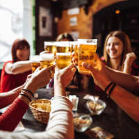 Resident having drinks in bar near Lexington in The Woodlands, Texas