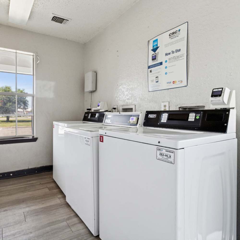 Community laundry area at Arbors of Taylor in Taylor, Texas